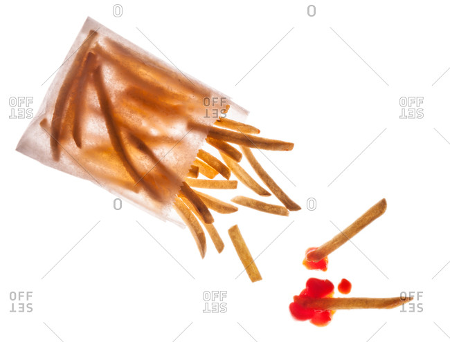French fries in a bag with ketchup