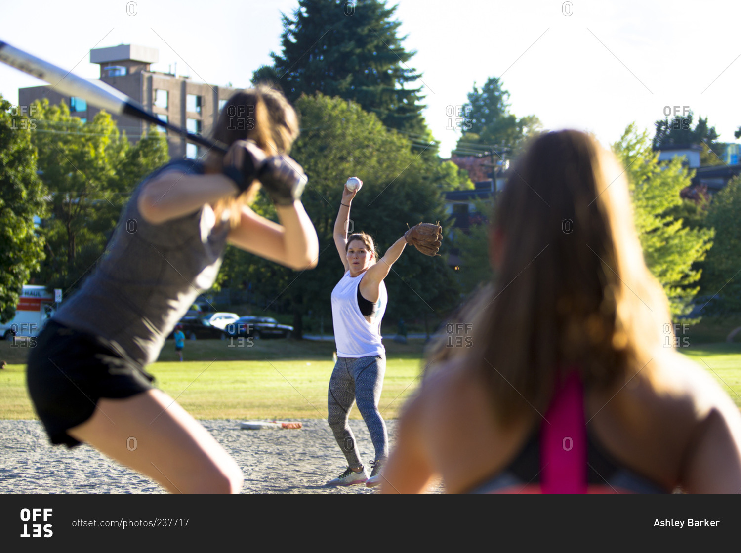 Pitcher winding up during a softball game in Vancouver, Canada
