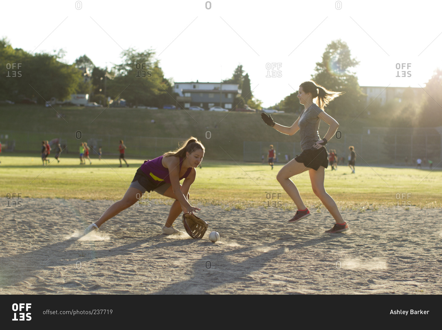 Softball game runner and infielder in Vancouver, Canada