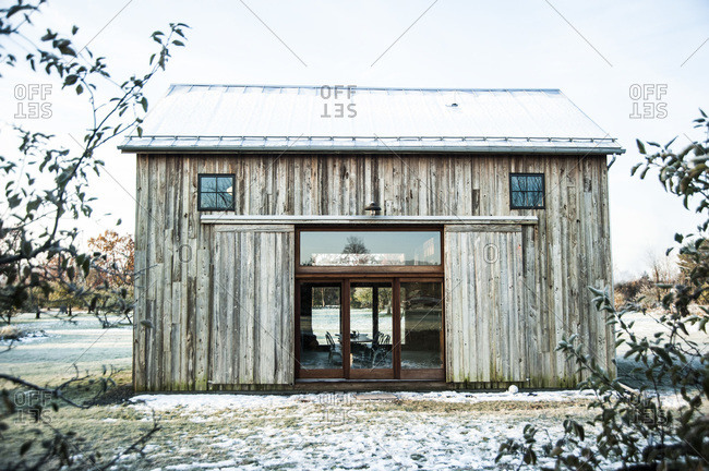 A renovated barn with mushroom wood siding