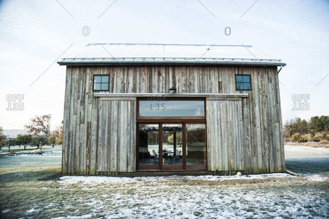 A renovated barn made with mushroom wood siding