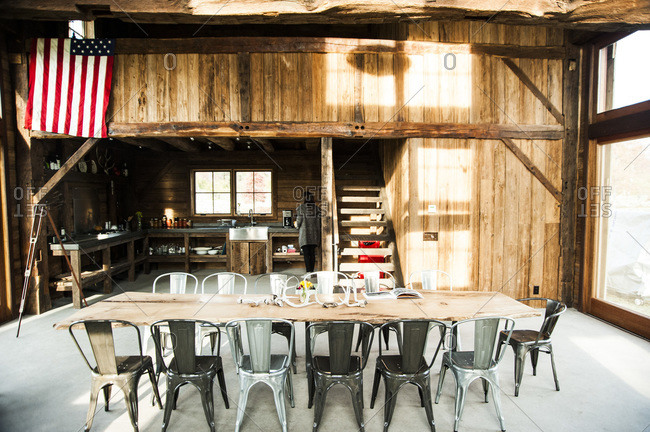 Accord, NY - October 31, 2011: A woman preparing coffee in a renovated barn