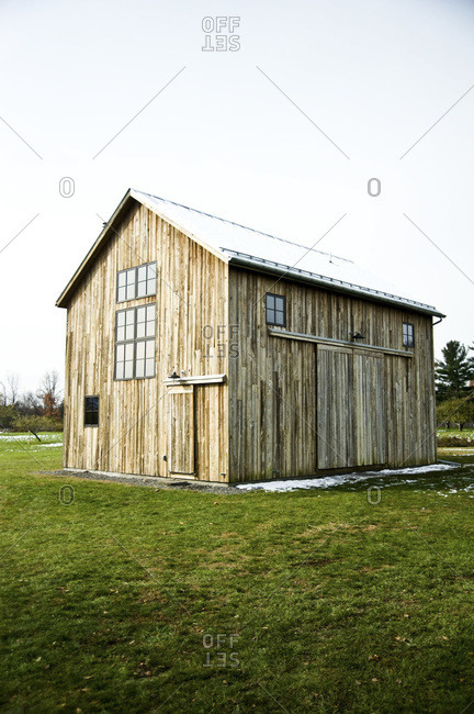 A renovated barn with mushroom wood siding