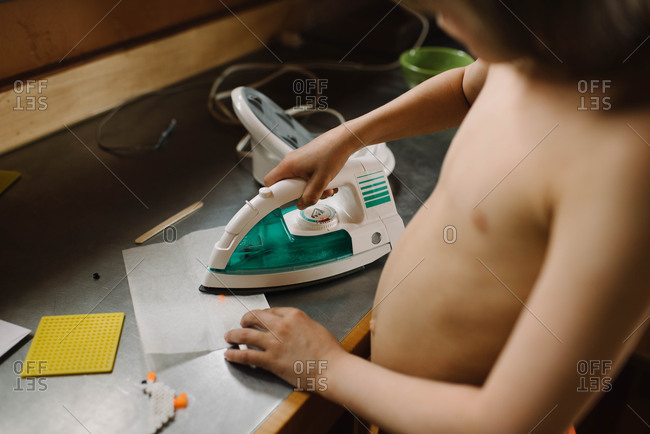 Child ironing fusible beads