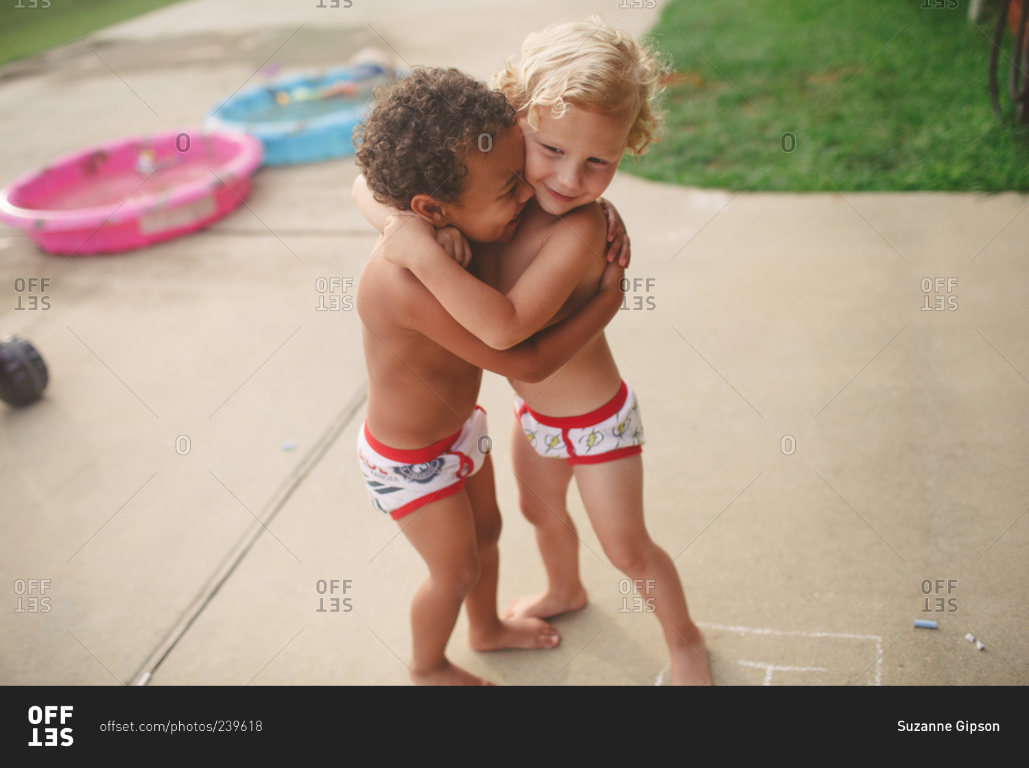 young boys hugging