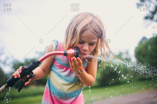 water hose stock photos - OFFSET