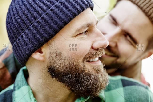 Close up of gay couple smiling