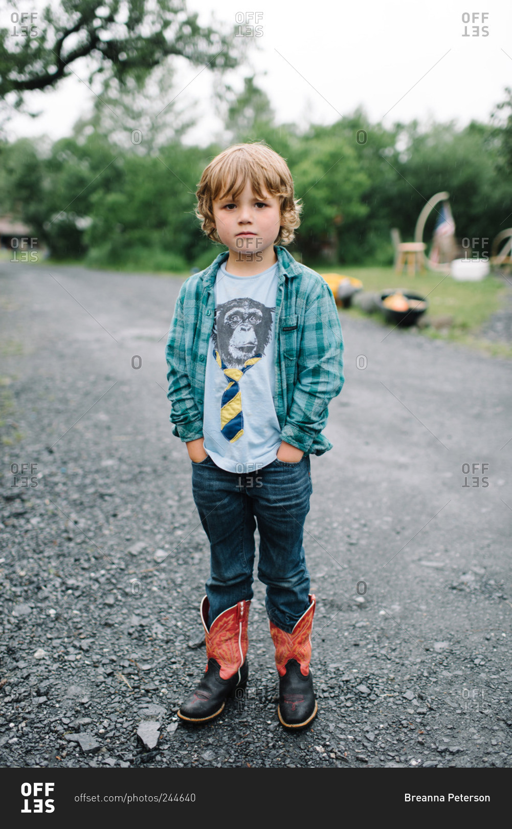 Little boy with hands in his pockets stock photo OFFSET