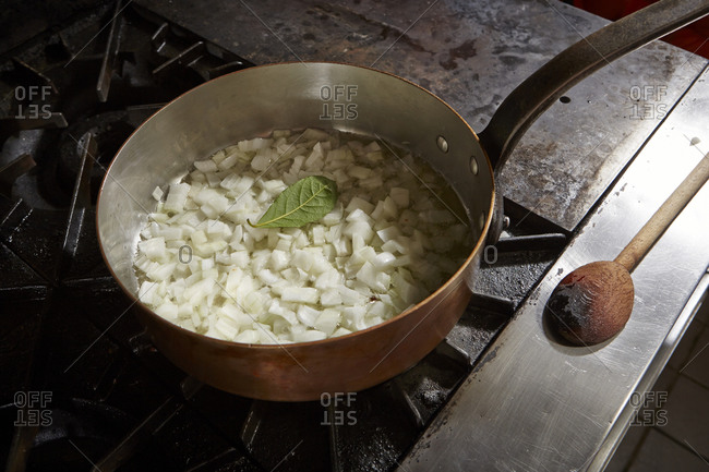 Chopped onion in a saute pan