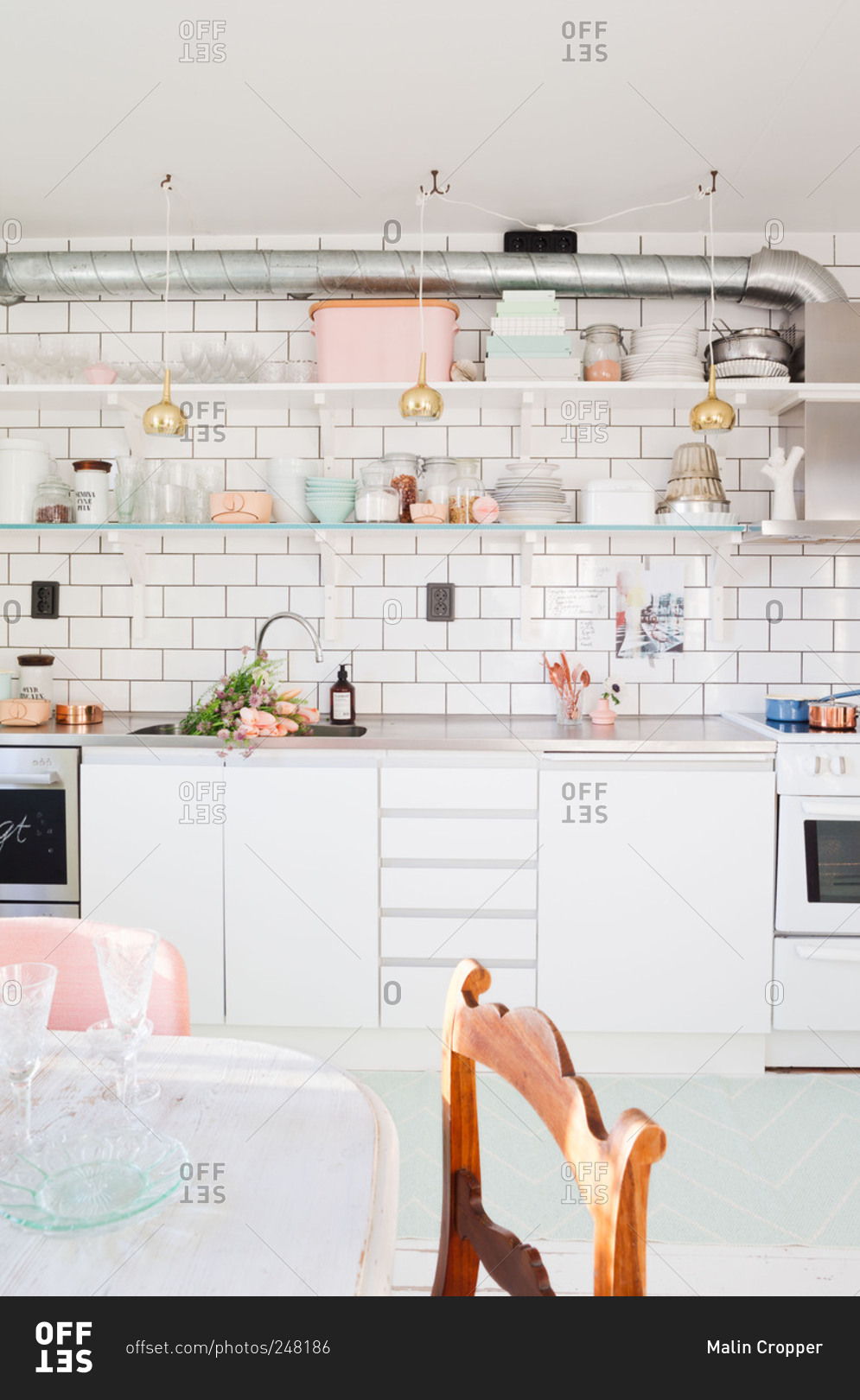 A white kitchen with pastel accents in Sweden