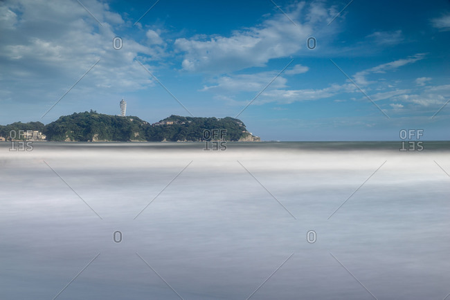 View of Enoshima Island from a distant beach