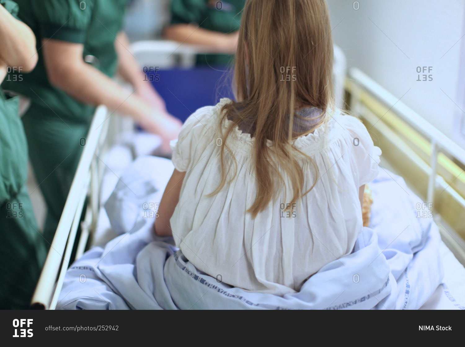 Sick child in hospital bed