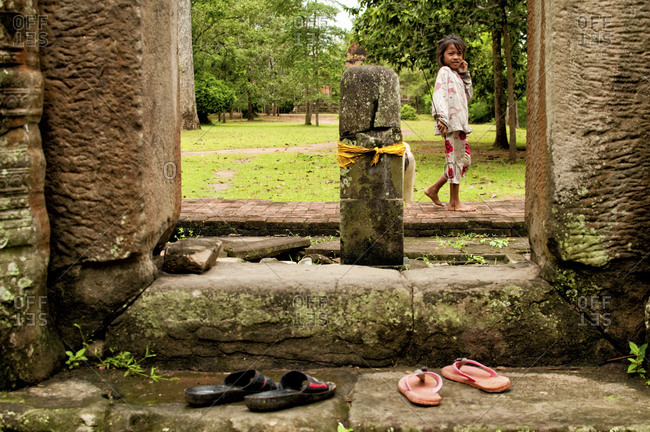Angkor, Cambodia - September 15, 2012: A girl in Angkor, Cambodia