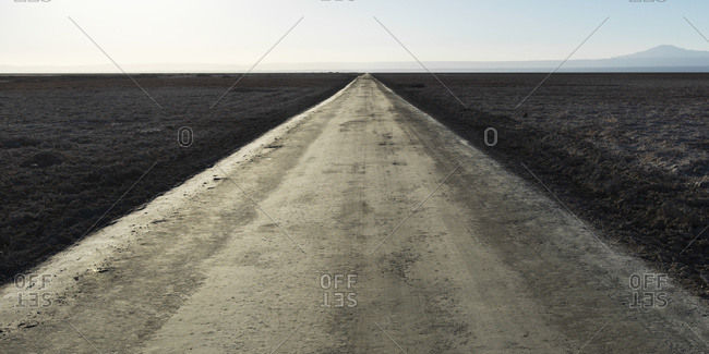 A road through a barren land in San Pedro de Atacama, Antofagasta Region, Chile