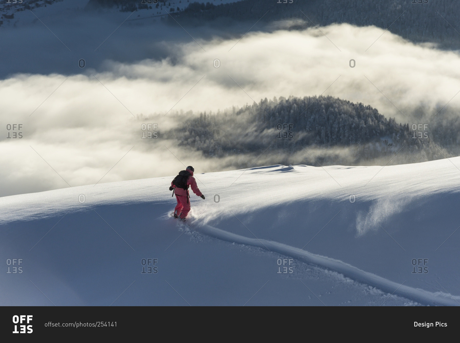 Snowboarding above the clouds in St. Moritz, Graubunden, Switzerland