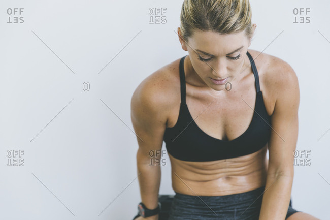 Woman perspiring after a work out
