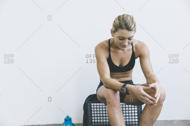 Woman sitting after a work out
