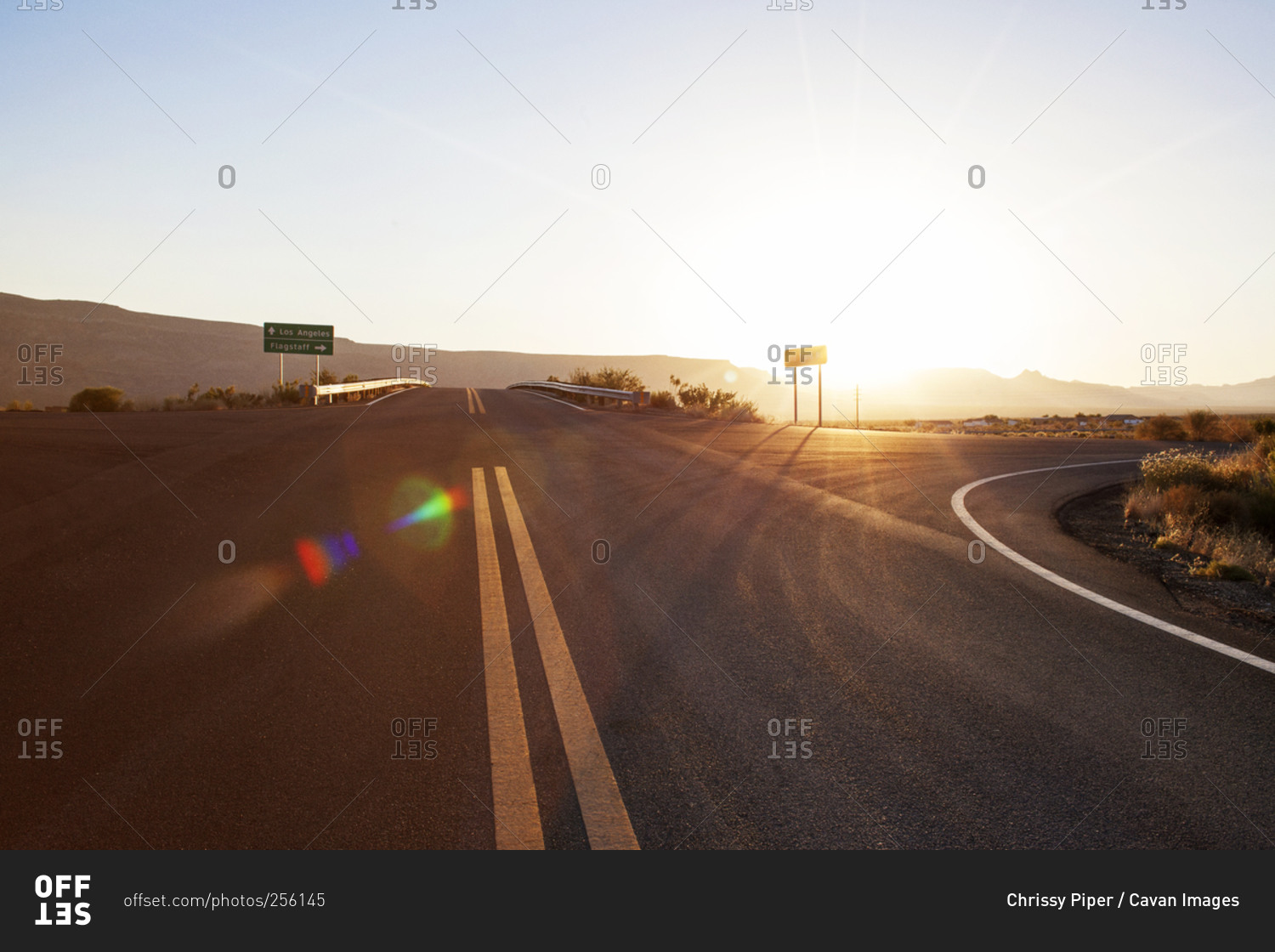 Road intersection in rural desert setting stock photo OFFSET
