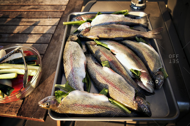 Fish stuffed with leaves by veggies