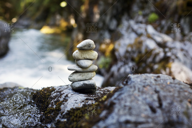 Rocks stacked in a rural winter setting