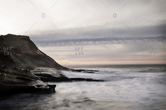 Rocky barren coastline along ocean