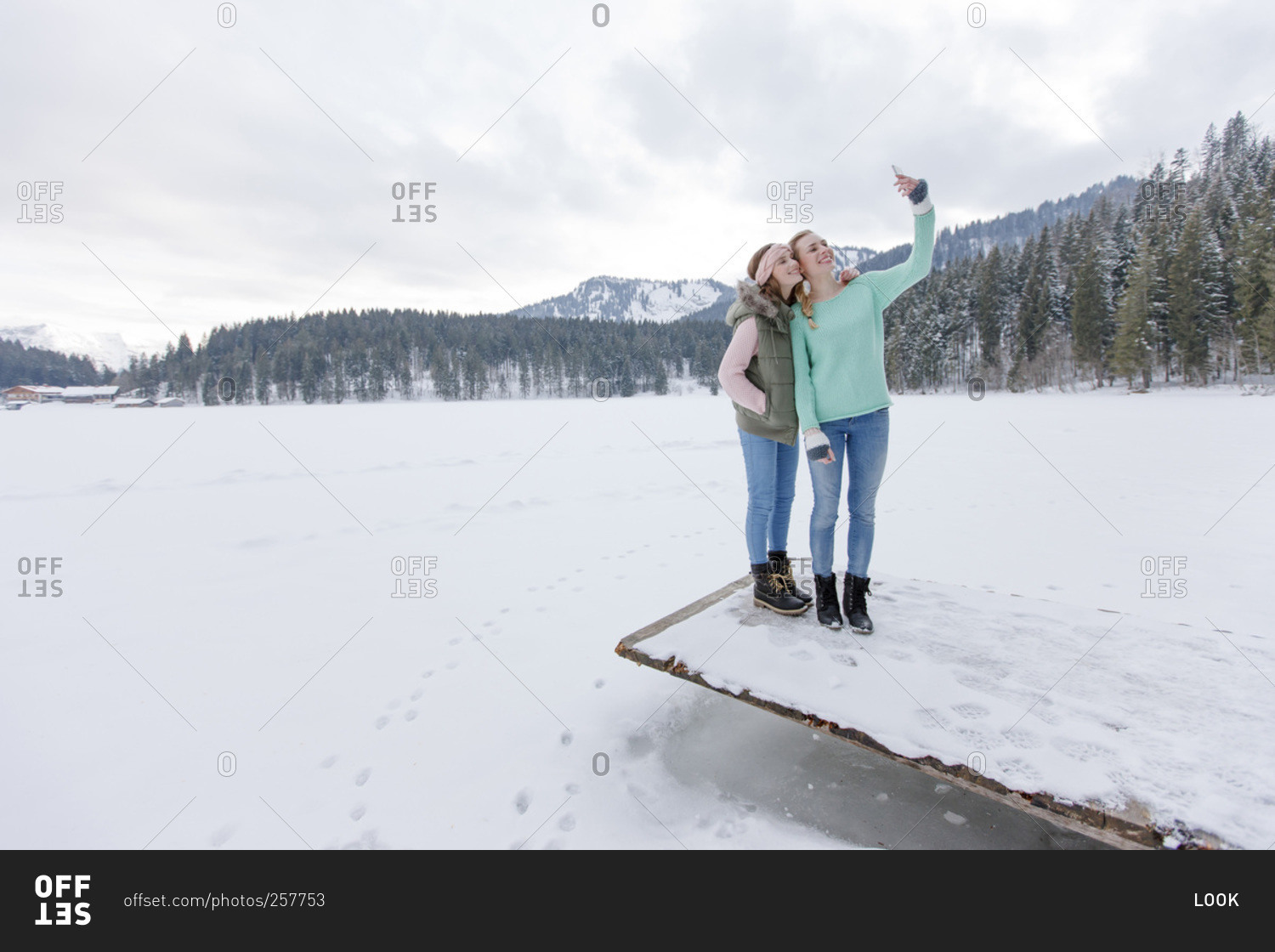 Young women taking a selfie in winter