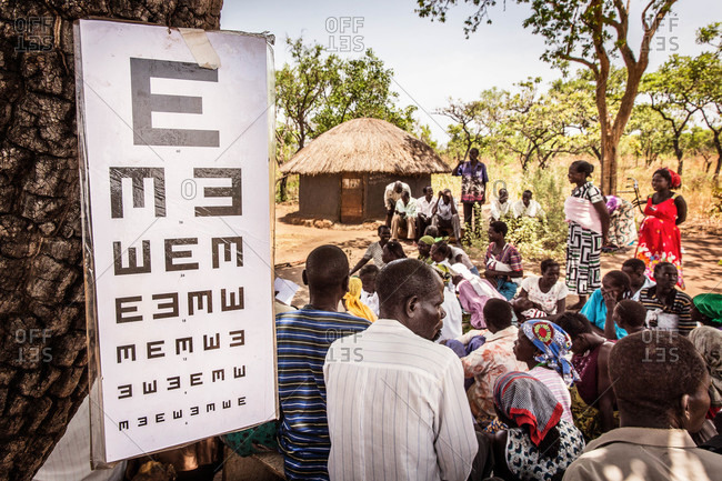 Paicho, Uganda - March 4, 2015: Group of people attending an eye clinic in Uganda