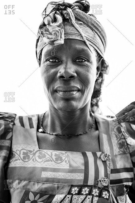 Paicho, Uganda - March 5, 2015: Portrait of a Ugandan woman in a dress and head wrap