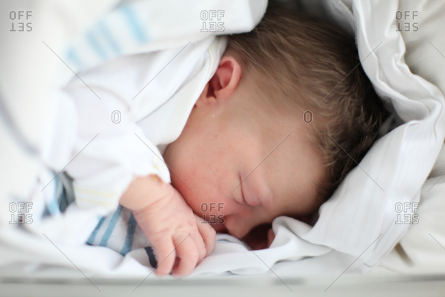 Cute Newborn Baby With Hair Sleeping Stock Photo Offset