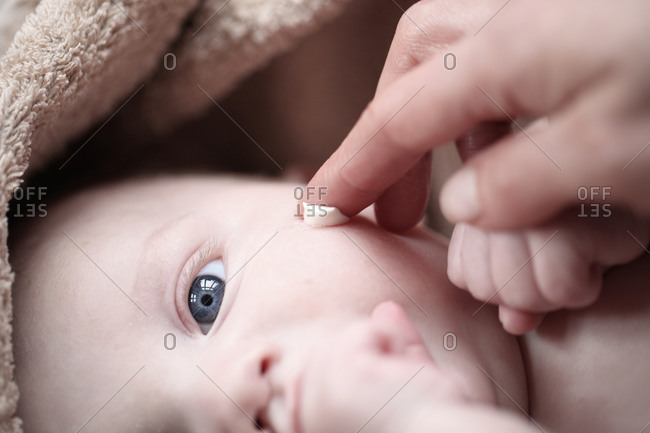 Lotion on baby's sensitive skin