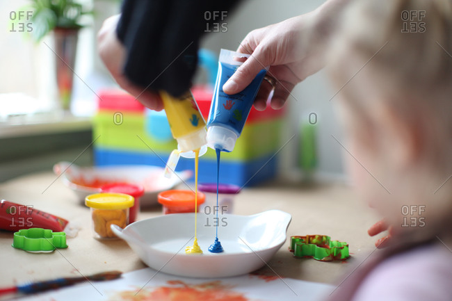 Mixing paints for kindergarten class