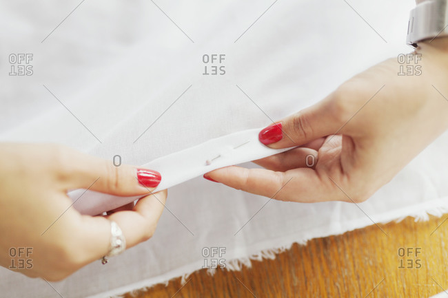 Woman holding pinned cloth