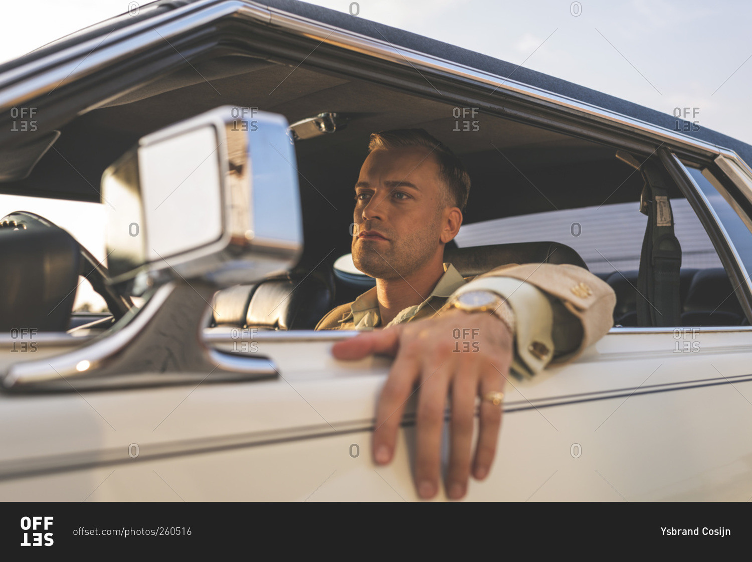 Man With Arm On Window Sitting In A Vintage Car Stock Photo Offset