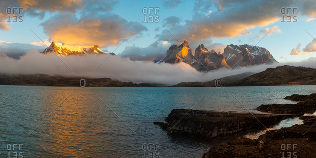 Sunrise over Cuernos del Paine, Torres del Paine National Park and Lago Pehoe, Chilean Patagonia, Chile