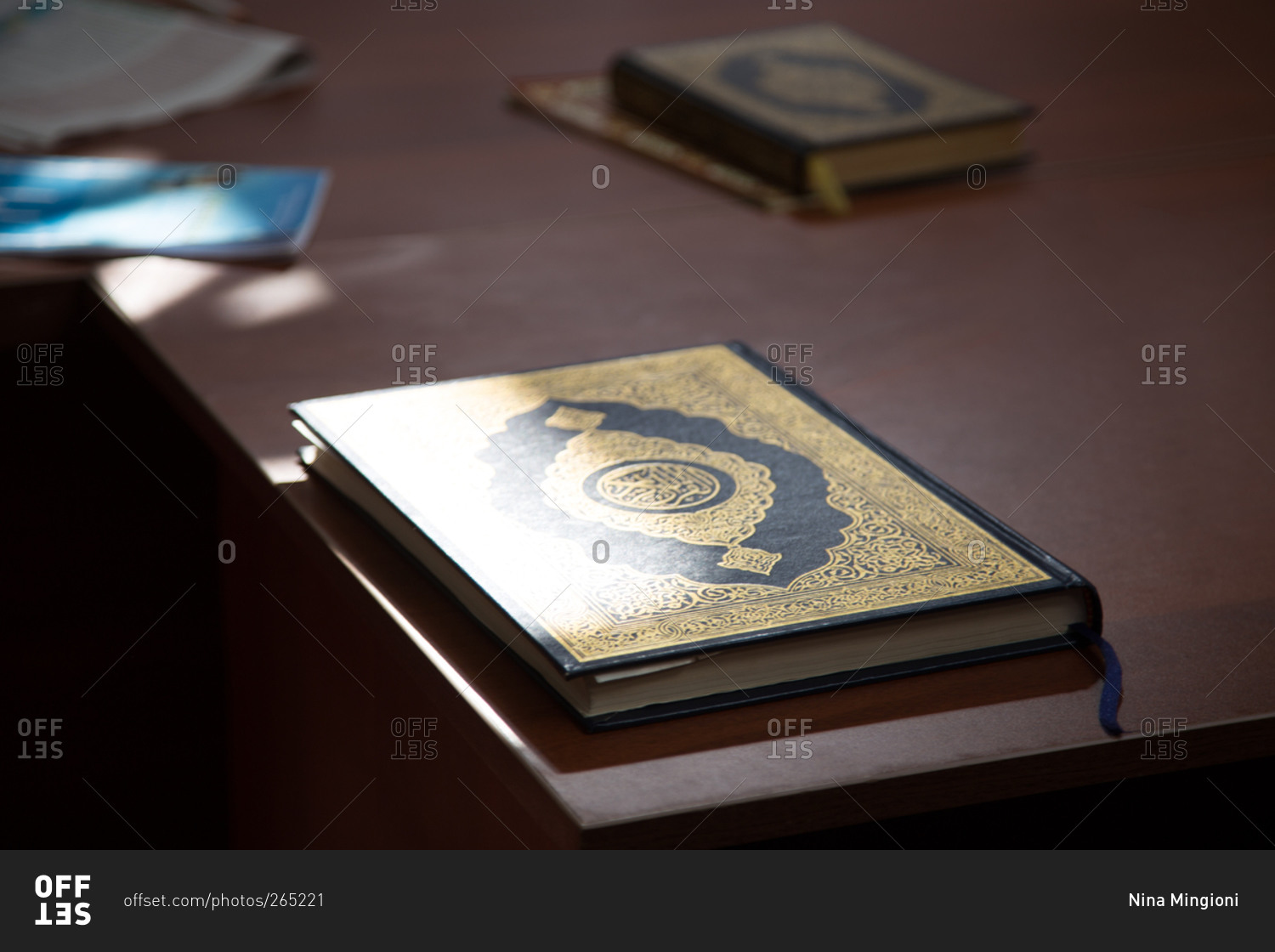 Prayer book on the edge of table in mosque