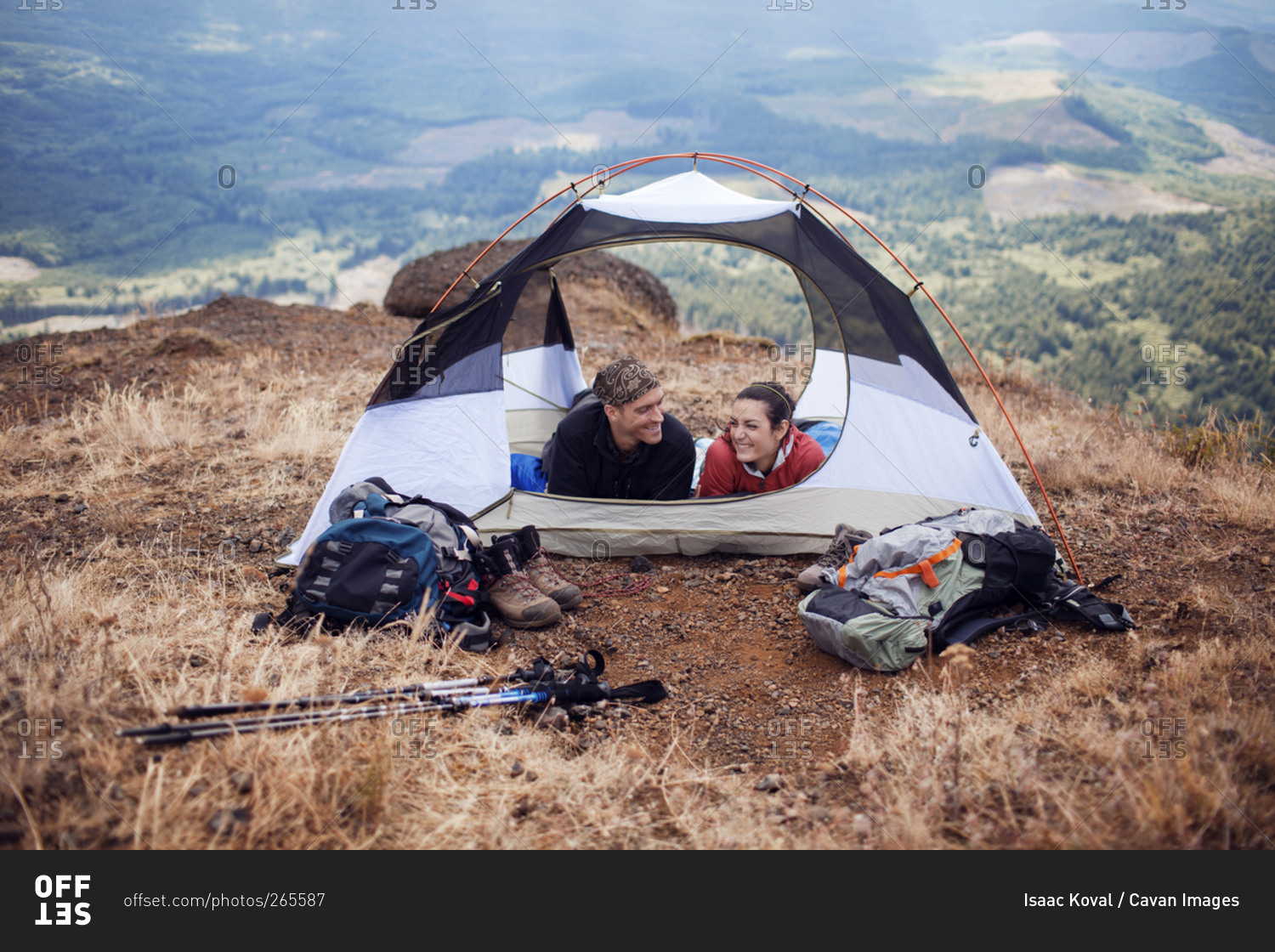 Couple hanging out in their tent in Oregon