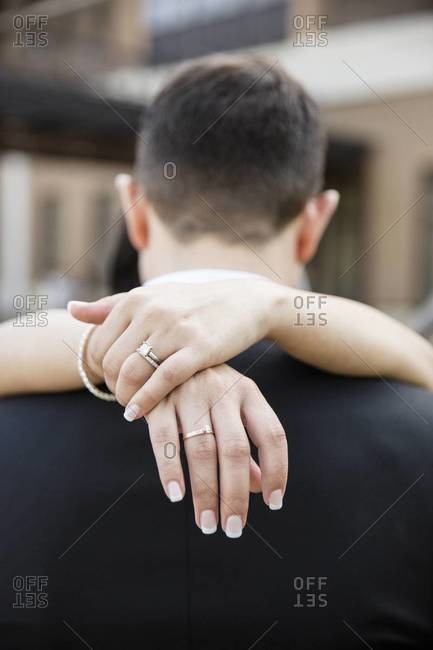 Close-up of bride's hands around groom, Hamilton, Ontario, Canada