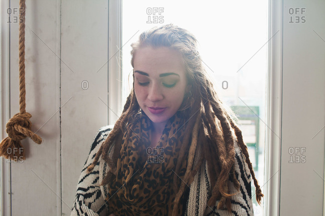 Young Woman With Long Dreads In Sunlight Stock Photo Offset