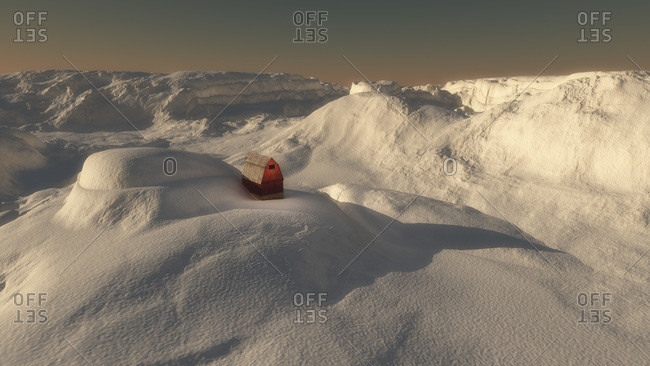 Red barn in a snowy desolate landscape