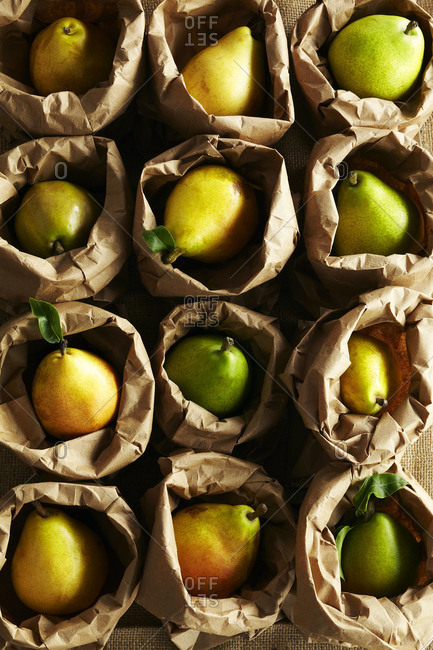 A variety of pears on a burlap cloth