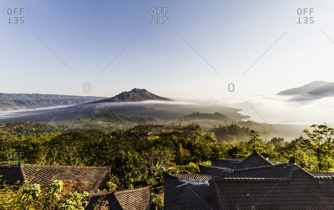 Panoramic view of Mount Batur and Batur Lake at sunrise from Kintamani, Bali, Indonesia