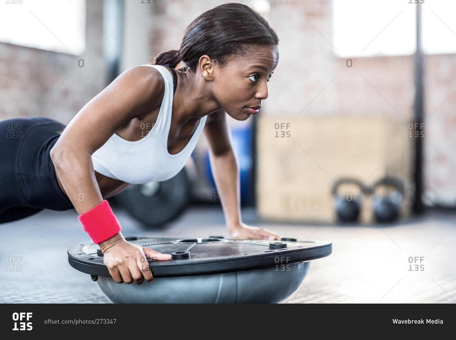 Muscular woman doing fitness workout