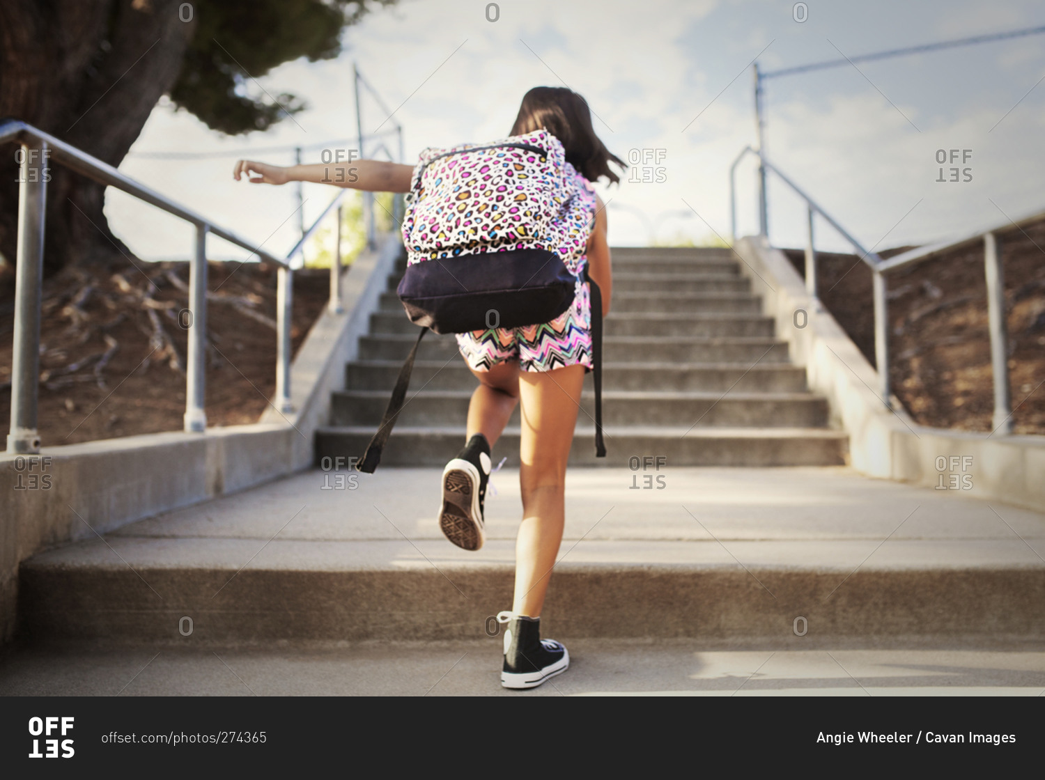 Girl with outlet a backpack