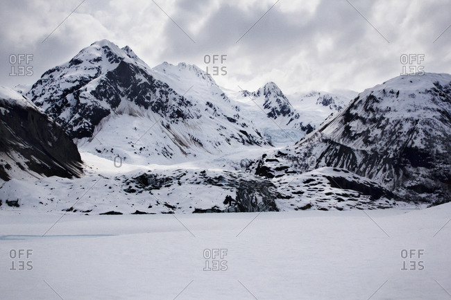 Barren landscape of snow and mountain peaks