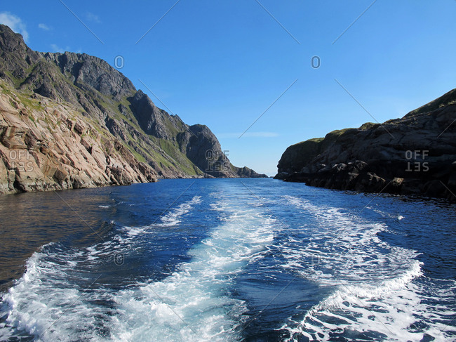 Frothy sea in a boat's wake in the Lofoten Islands, Norway