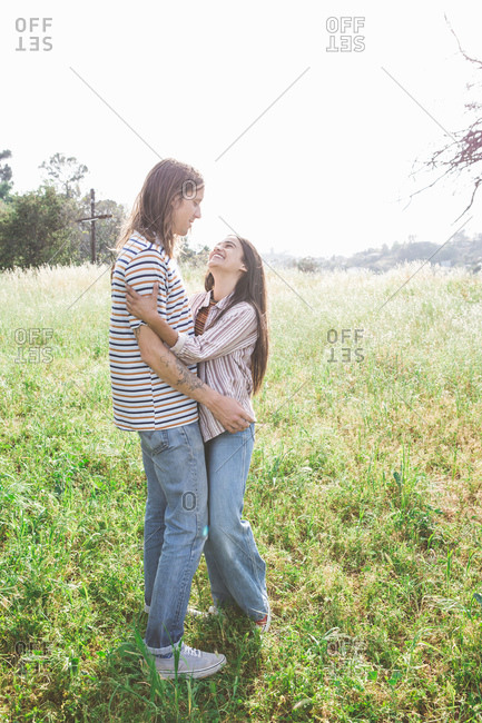 Portrait of a loving couple in a field