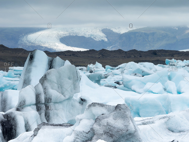 Glacial lake on the edge of Vatnajokull National Park at the head of the Breidamerkurjokull glacier, created after the glacier started receding from the edge of the Atlantic Ocean