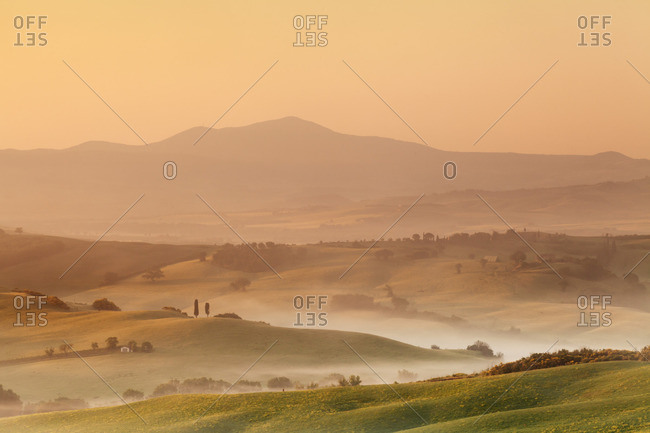 Sunrise at Val d'Orcia, near San Quirico, Val d'Orcia (Orcia Valley), UNESCO World Heritage Site, Siena Province, Tuscany, Italy