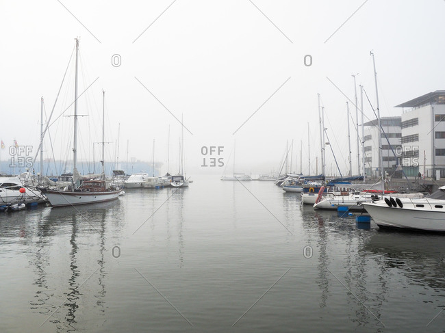 Boats in a marina on a foggy day in Gothenburg, Sweden