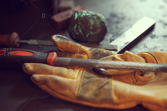 Old tools and work gloves